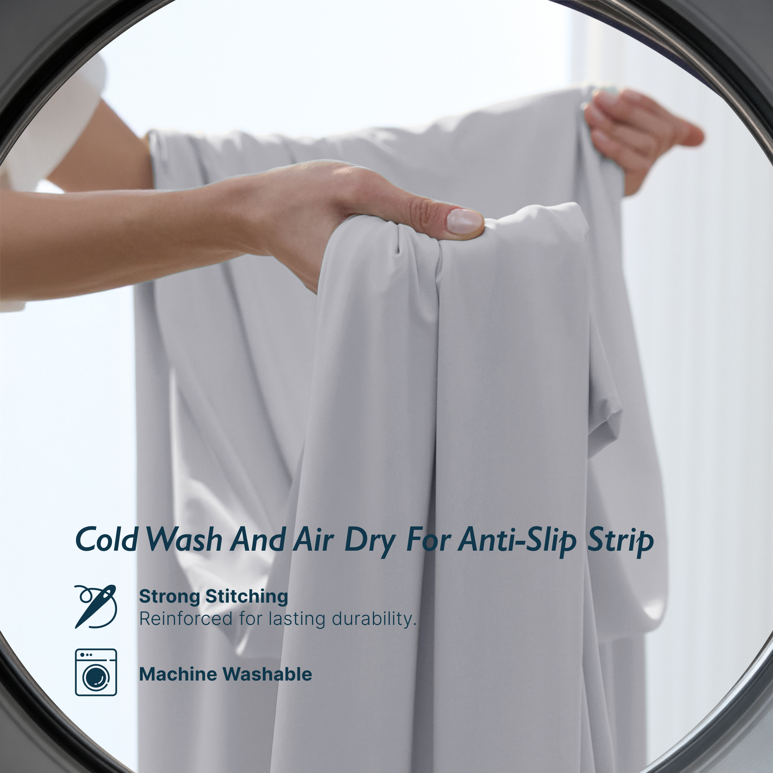 Misty grey Breescape cooling sheet with anti-slip strip, strong stitching, and machine washable icon.