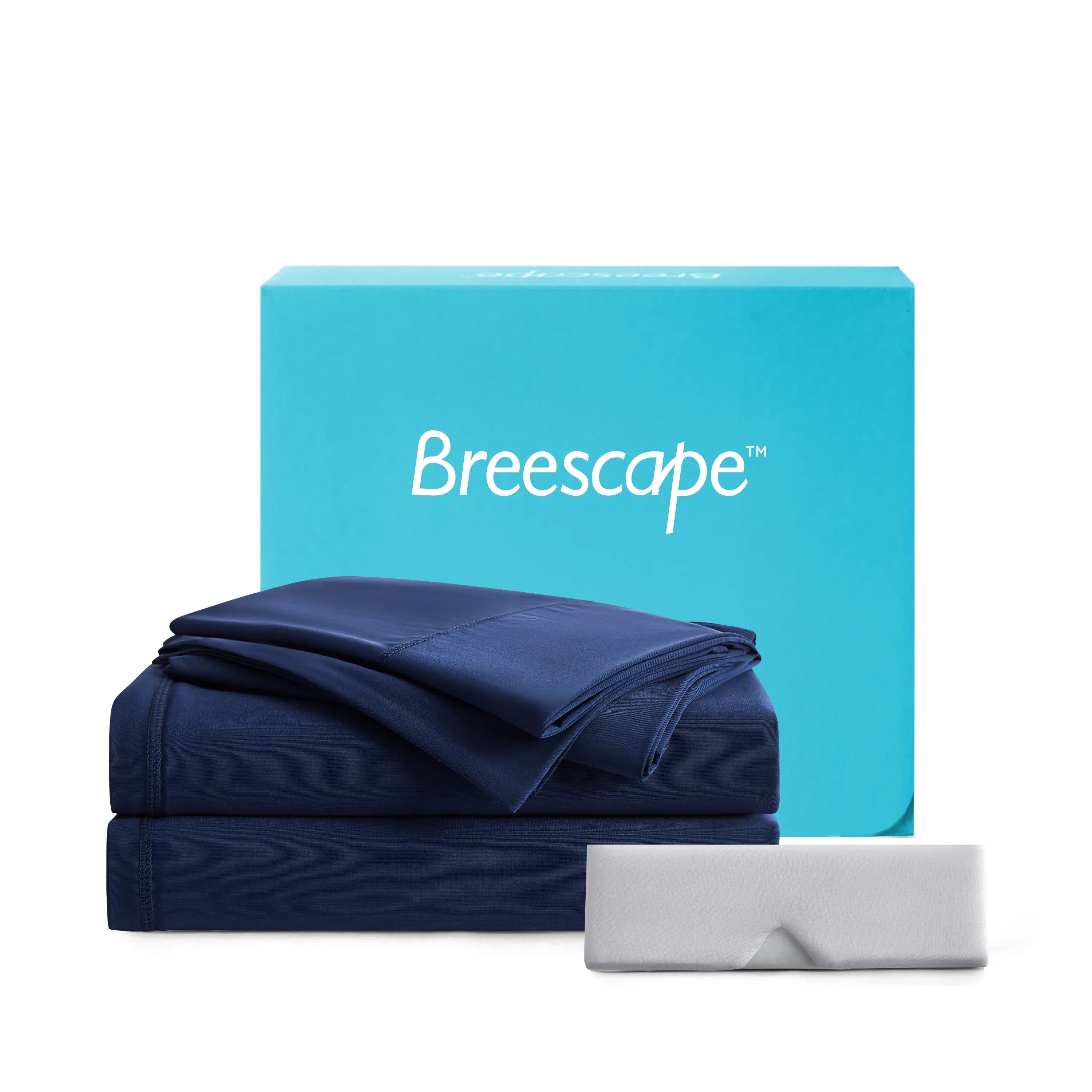 Navy blue bedding set with a Breescape branded box on a white background