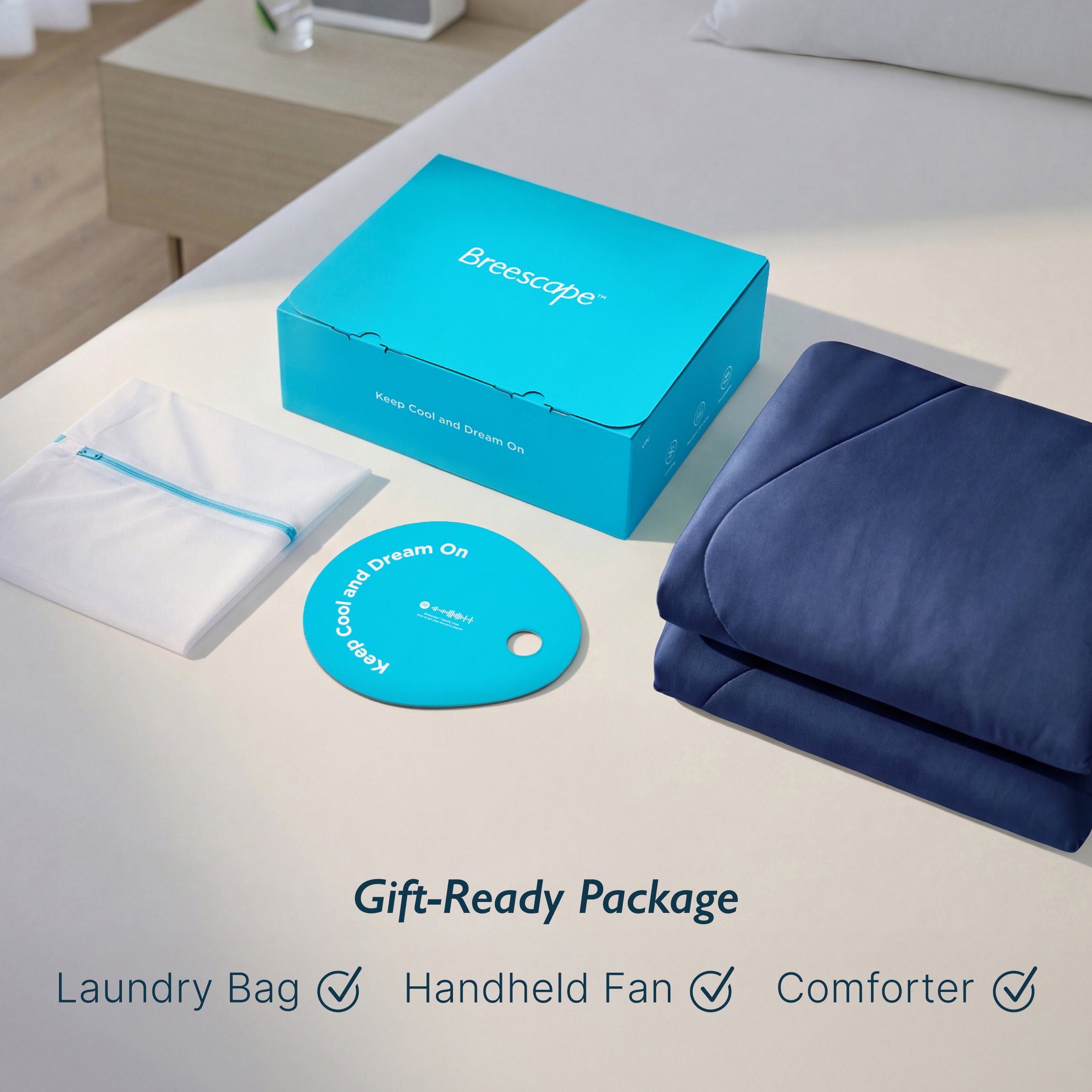 Breescape cooling comforter: twilight blue folded comforter, laundry bag, fan. Gift-Ready Package.