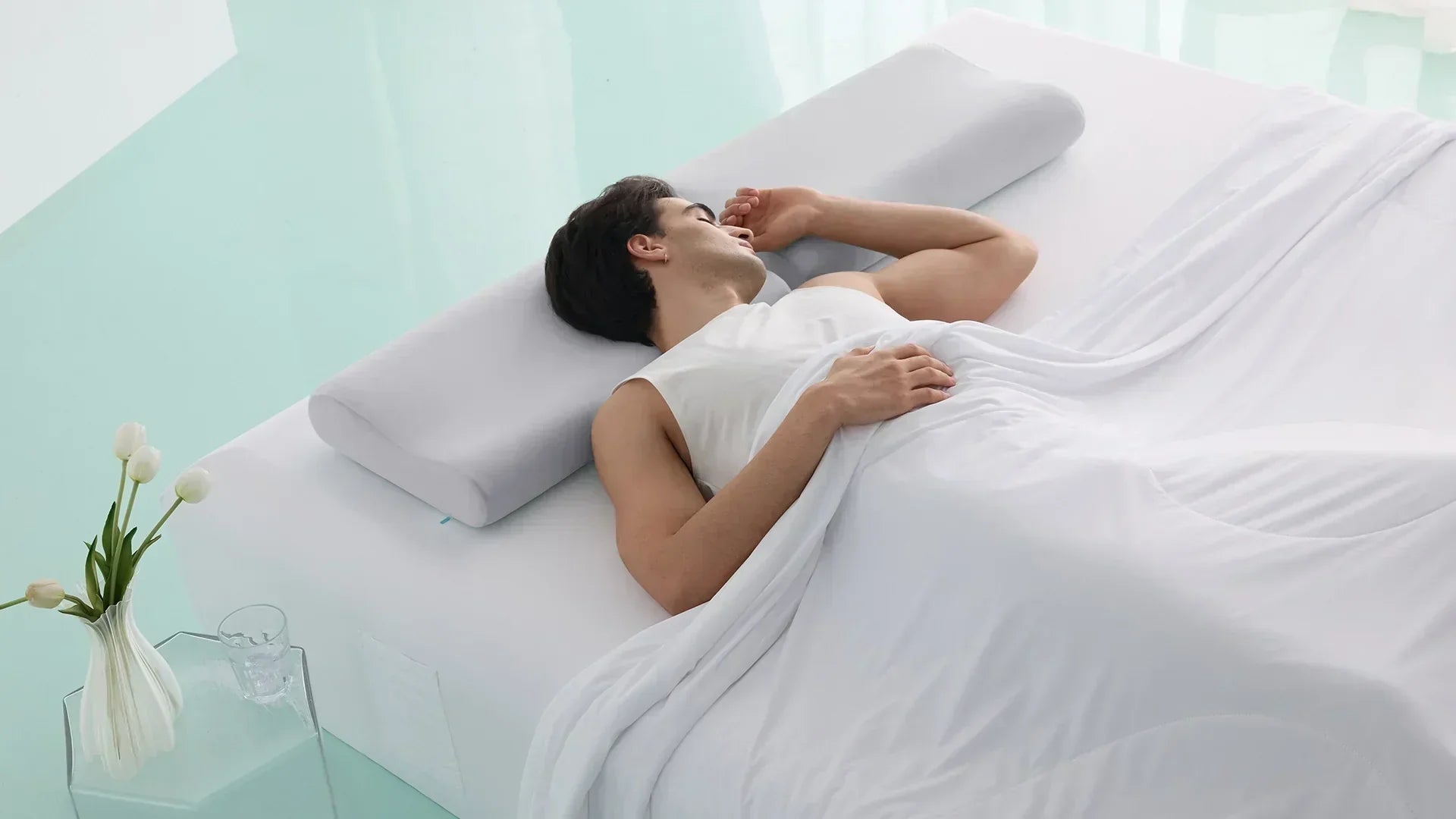 Back sleeper using a contoured cooling pillow for neck support and temperature regulation