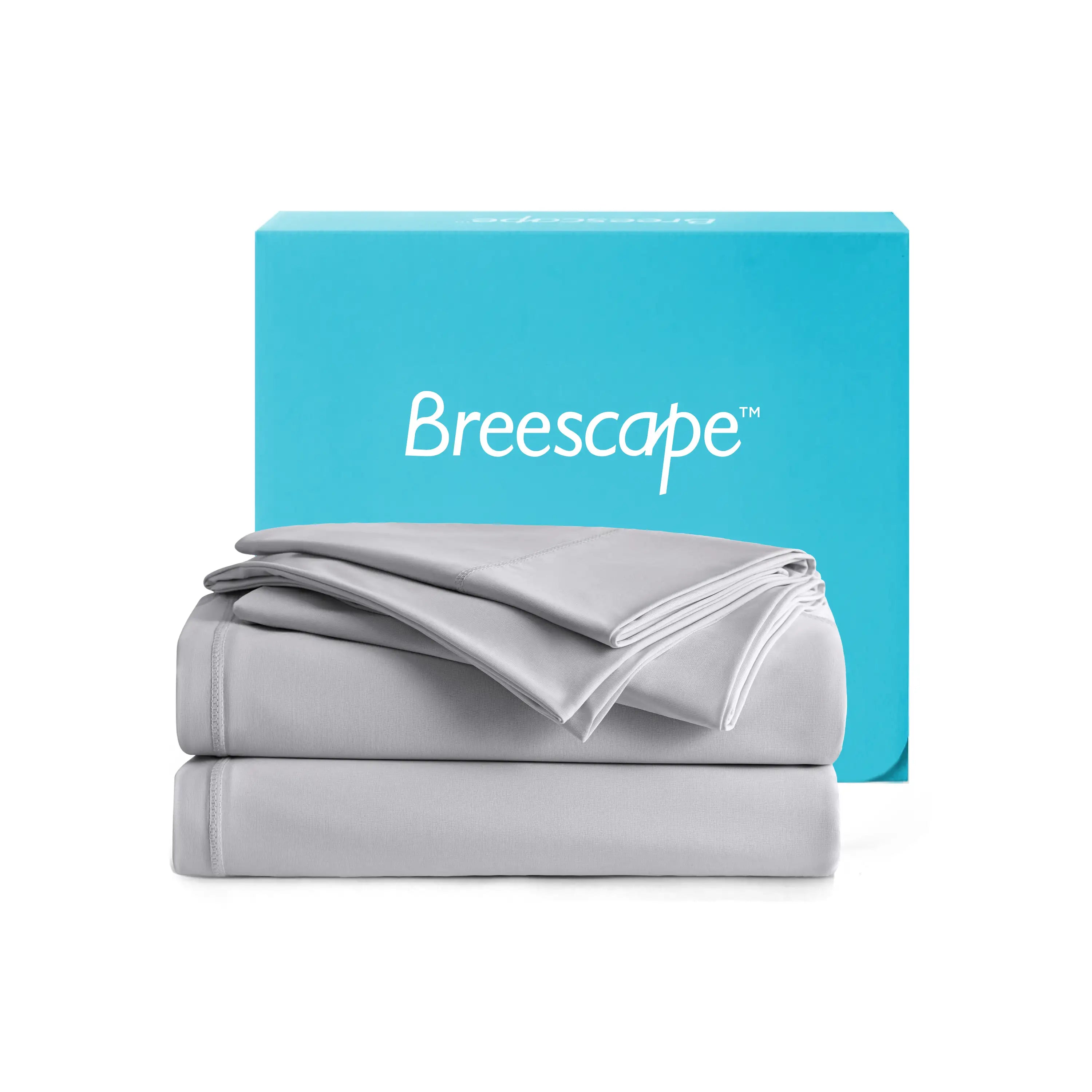 Gray bedding set with a blue Breescape box on a white background #color_misty-grey