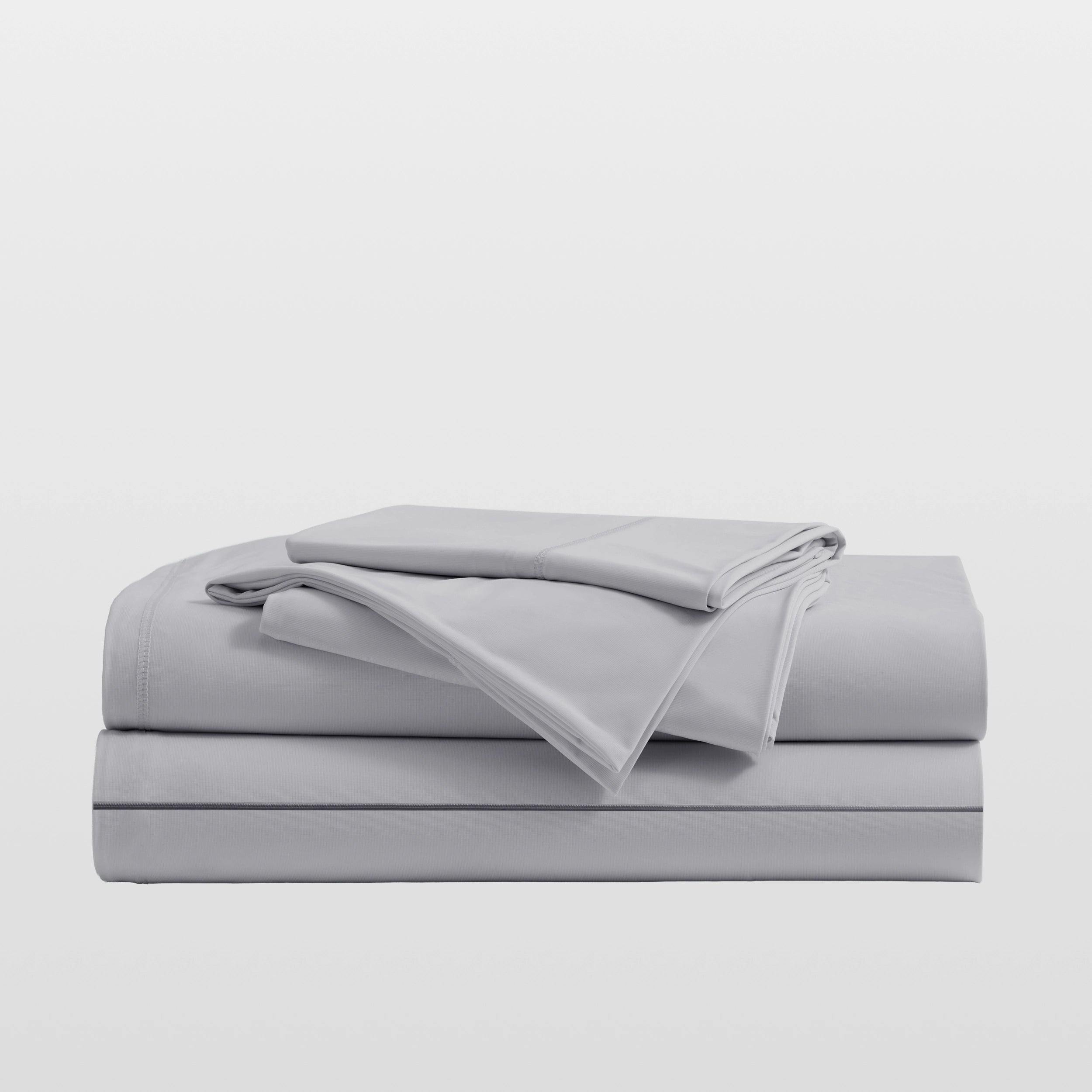Misty grey Breescape cooling sheets set, breathable, cold touch bedding for hot sleepers.