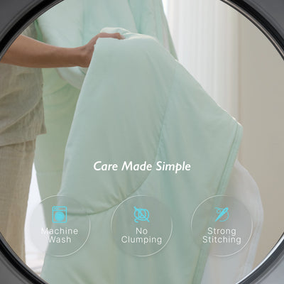 Mint green Breescape breathable cooling comforter: machine wash, no clumping, Care Made Simple.