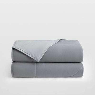 Breescape dual-sided cooling comforter in misty grey colorblock design for hot sleepers.