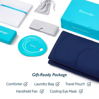 Breescape gift-ready bundle: cooling comforter, misty grey eye mask, snow white laundry bag, travel pouch, fan.