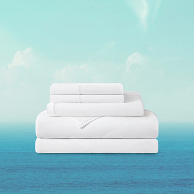 Stack of white towels on a gradient background