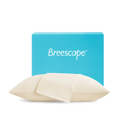 Breescape product packaging with a blue box and beige product on a white background Ashley Graham Pick Breescape Cooling Pillowcase #color_ivory