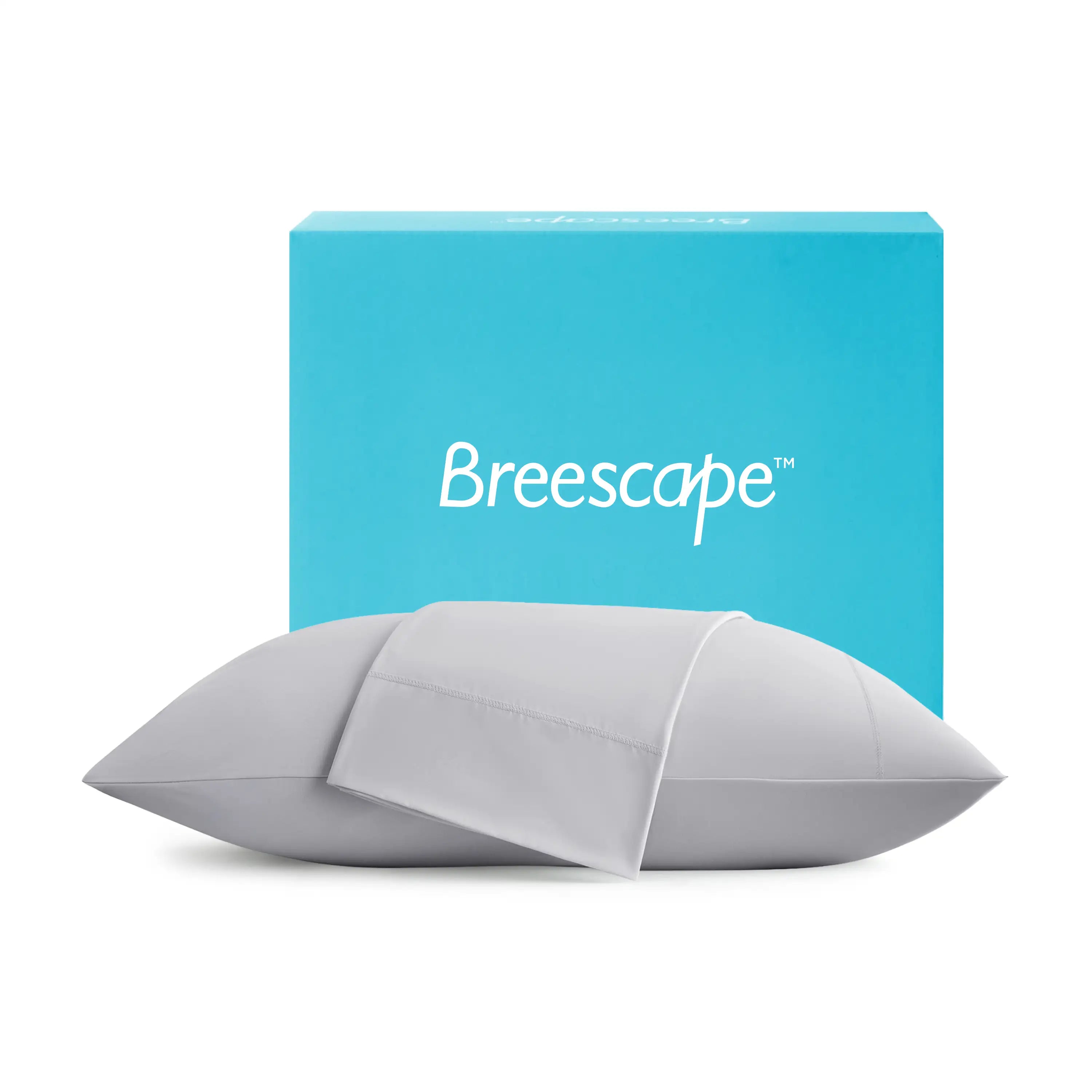 Gray pillow in front of a blue Breescape box on a white background edredones para camas #color_misty-grey