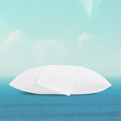 White umbrella floating on a blue surface with a light blue gradient background