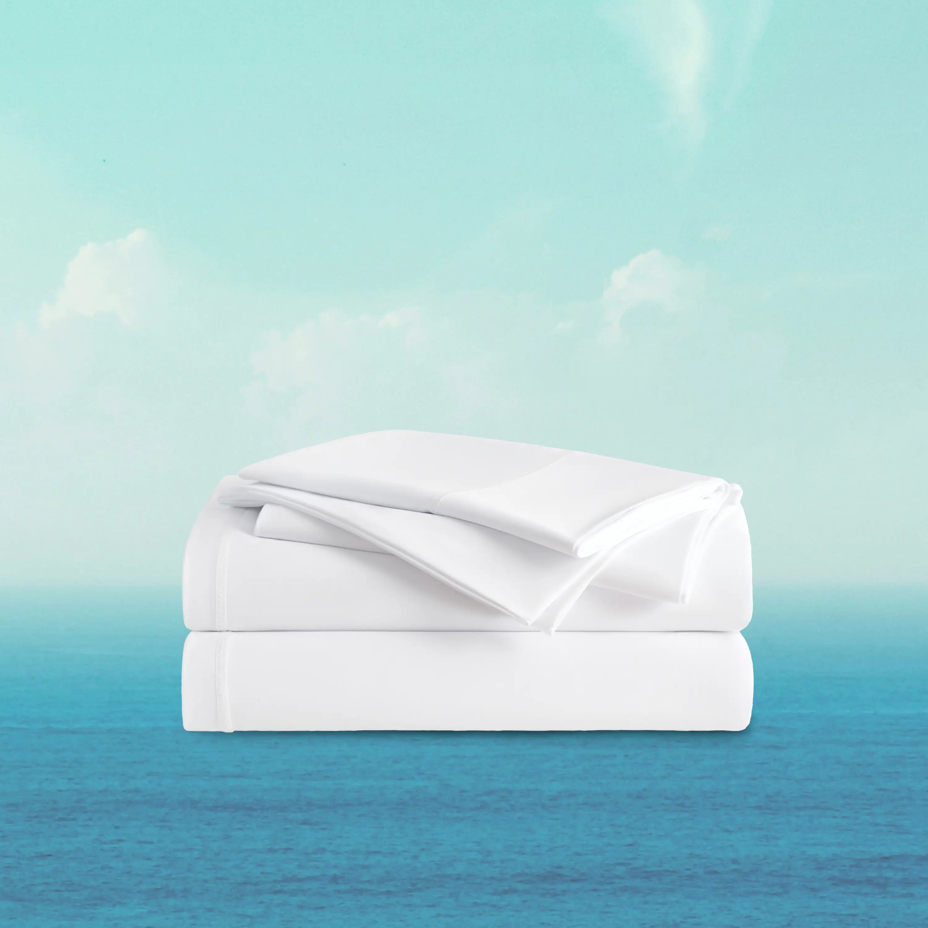 Folded white blanket on a gradient background