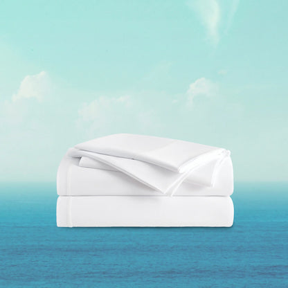 Folded white blanket on a gradient background