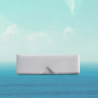 White rectangular object on a gradient blue and green background