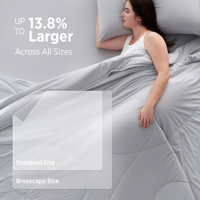 Breescape cooling comforter set in ivory is up to 13.8% larger than standard sizes for full coverage.