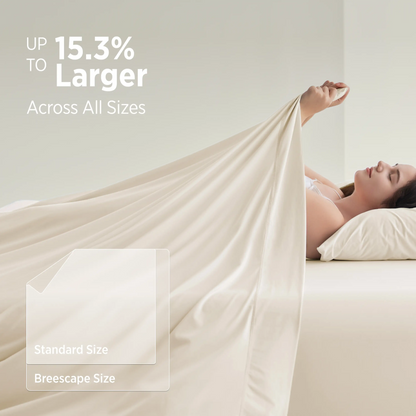 Woman lying on a bed with a large beige blanket, promotional text about size increase. #color_ivory