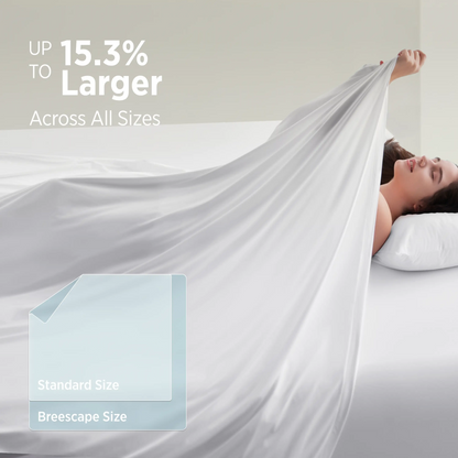Woman lying on a bed with a large white sheet draped over her, promoting a product size comparison. #color_snow-white